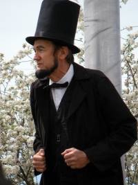 John Cooper as Abraham Lincoln