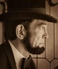 Ron Carley as Abraham Lincoln