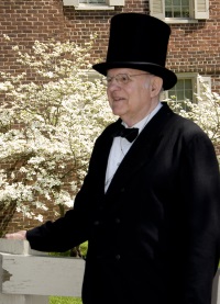 Tom Cecil as Abraham Lincoln