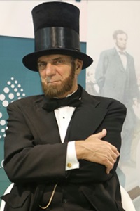 Tom Katsis as Abraham Lincoln