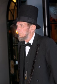 Verne Risty as Abraham Lincoln