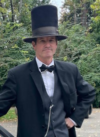 Mr. Warren Greer as Abraham Lincoln.