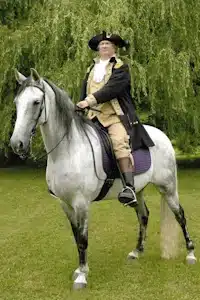 Mr. Dale Fellows of the Lincoln Presenters riding Blue as George Washington.